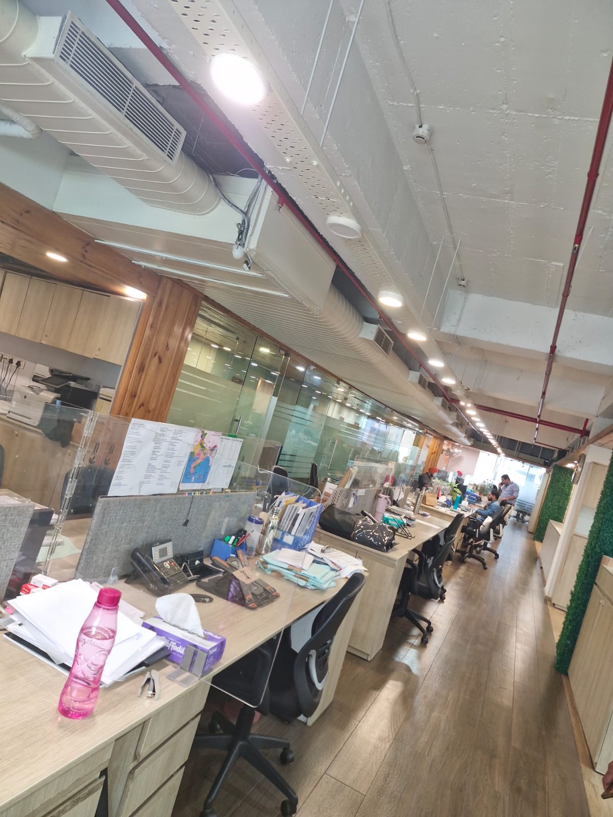 Ceiling building services along a commercial corridor